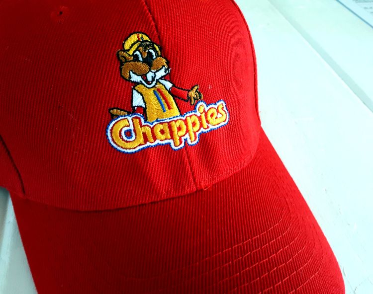 Red cap with full colour Chappies mascot embroidery Chappies mascot cap
